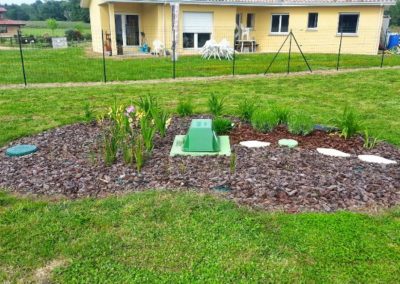 installation d'une fosse septique dans le jardin de la maison